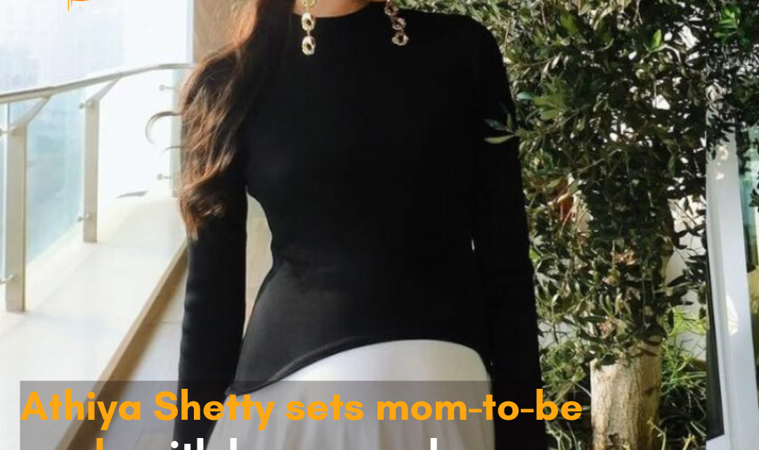 Mom-to-be Athiya Shetty cradles her baby bump, flaunting her maternity style.