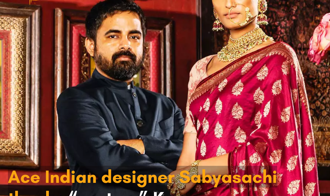 The designer says the industrialist is “helping” him without divulging further details.