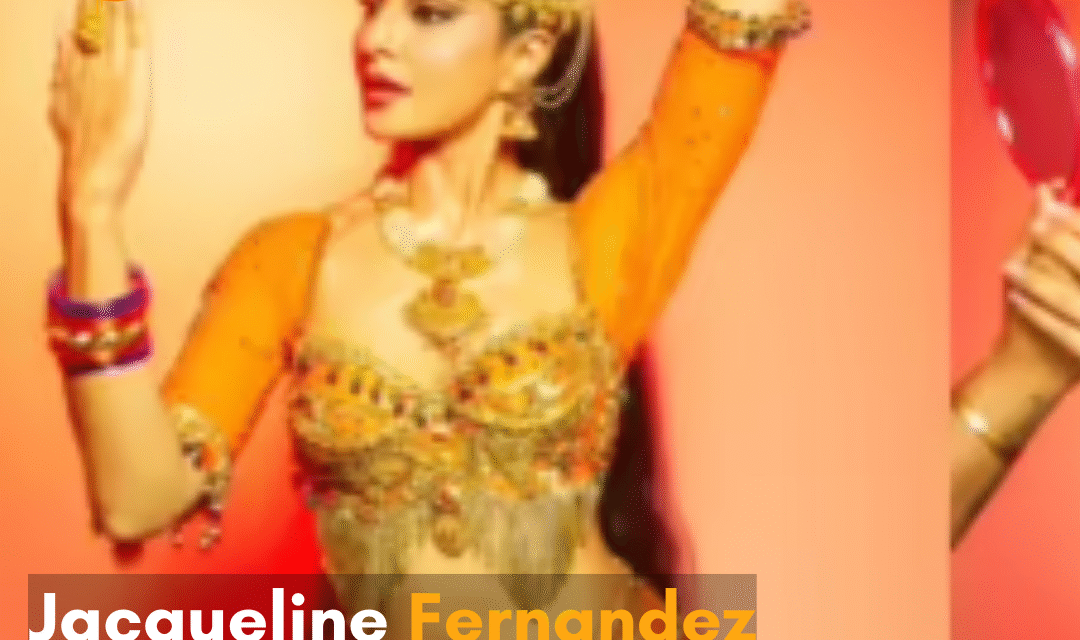 The actress looked stunning in a bright orange, embellished choli and a deep purple draped skirt.