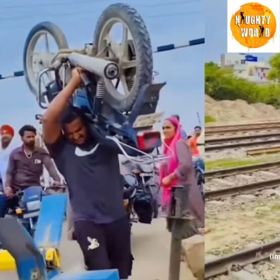 Trending: To avoid waiting at a railway crossing, a man lifts a 112 kg bike on his shoulders