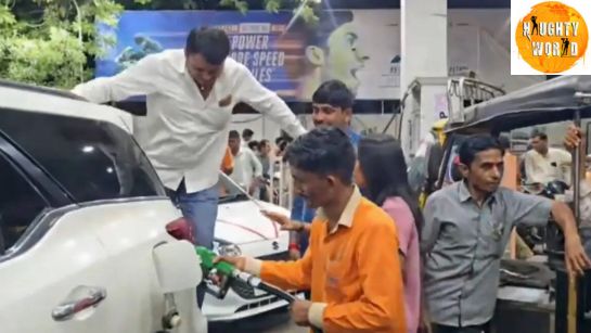 Trending: A man is seen jumping on a car to fill up with more fuel